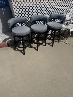 3 blue suede chairs