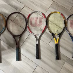 Family Set Of Tennis Rackets