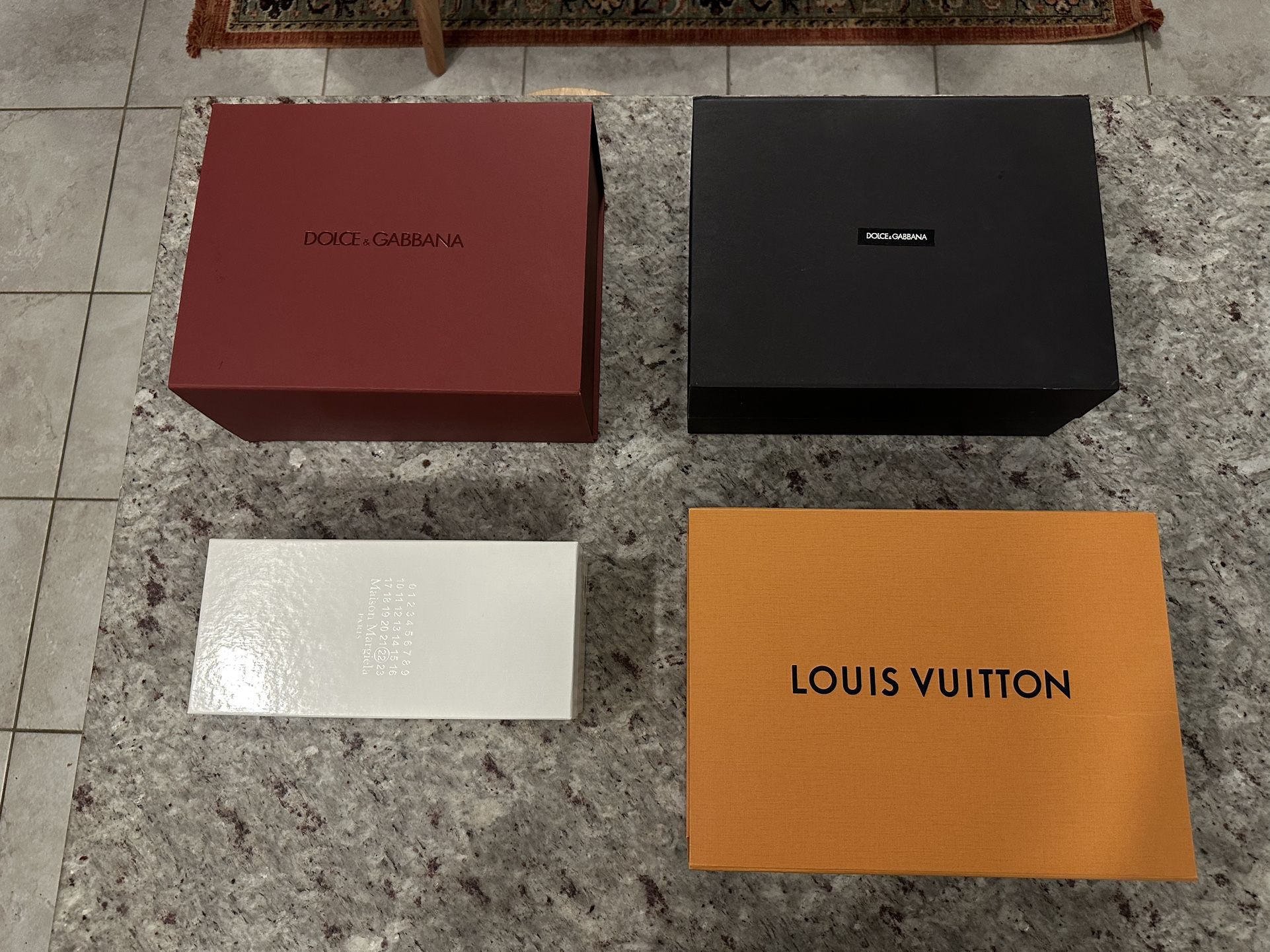 Designer Boxes. Margiela, Louis Vuitton, Dolce & Gabbana.
