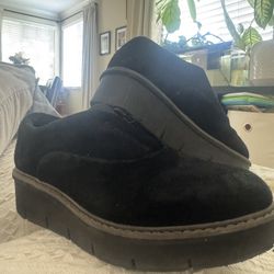 Clarks Airabell Sky black suede slip-on wedge shoe.