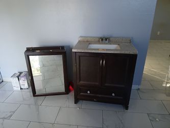 Sink vanity mirror and faucet