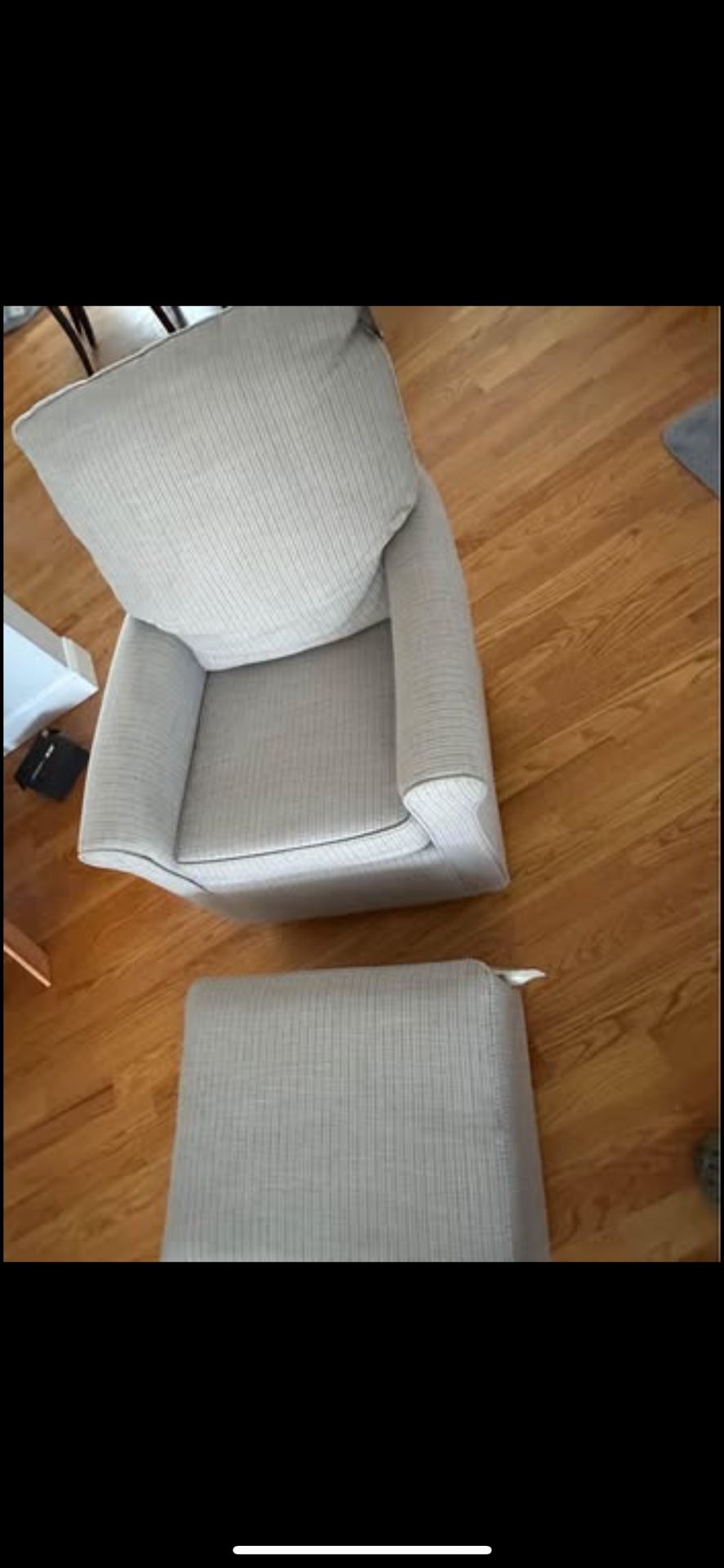 Chair with slide ottoman 