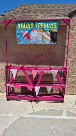 Wooden cart with wheels used to sell aguas frescas