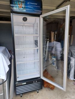 Commercial type soft drink or beer cooler.