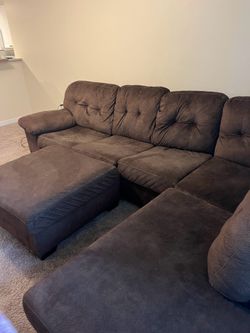 Large brown sectional couch