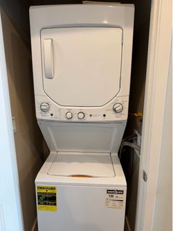 GE Unitized Spacemaker® 2.3 cu. ft. Capacity Washer with Stainless Steel Basket and 4.4 cu. ft. Capacity Gas Dryer