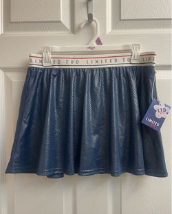 Brand new Girls dark blue skirt w built in shorts size M