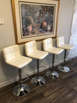 Brand new counter height white leather swivel barstools $25 each