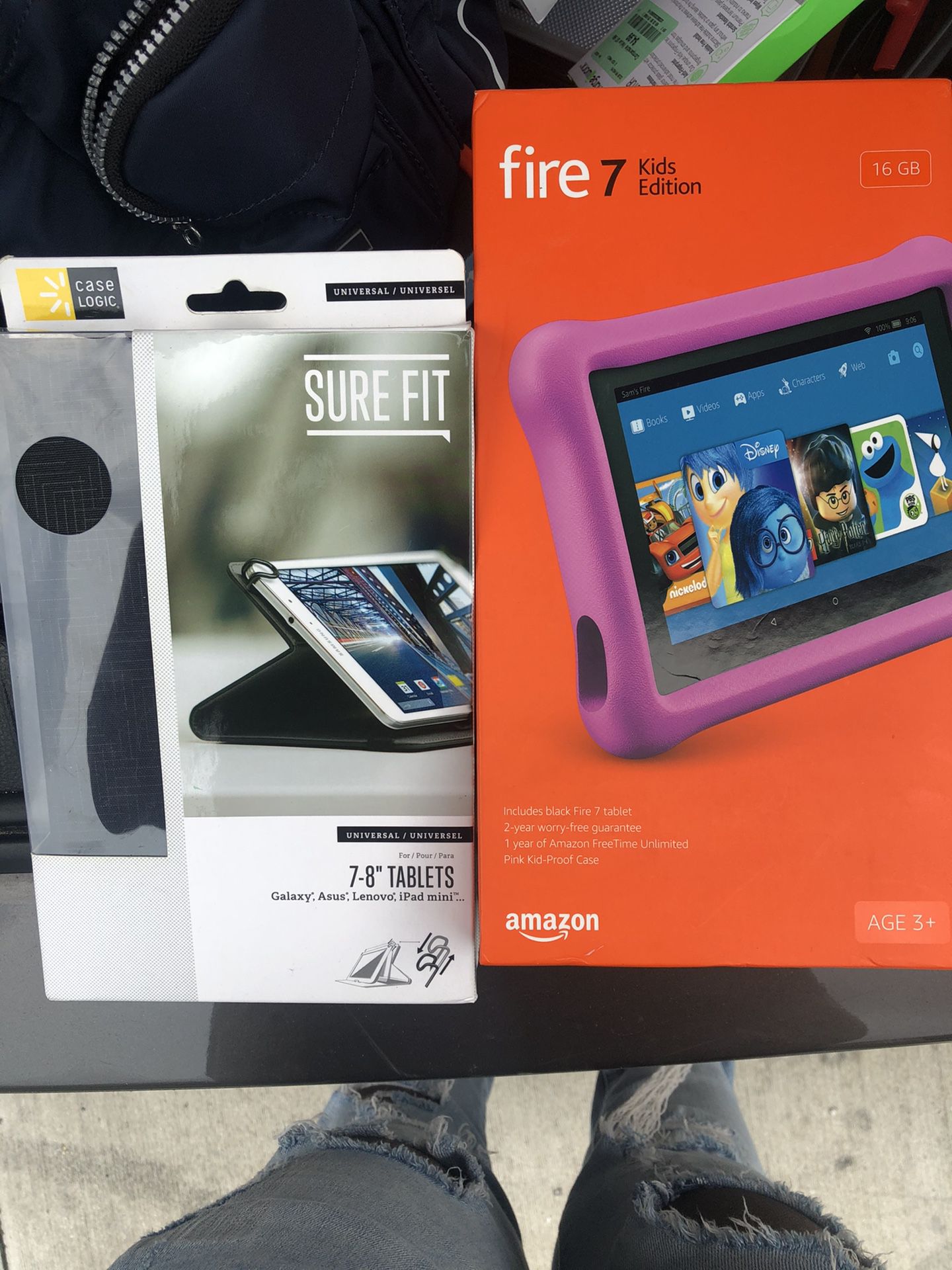 Amazon Fire 7 tablet with additional case.