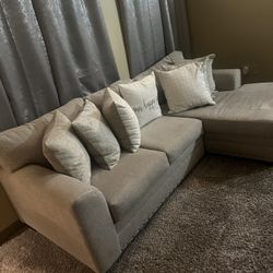Sectional And Spin Chair With All Pillows 