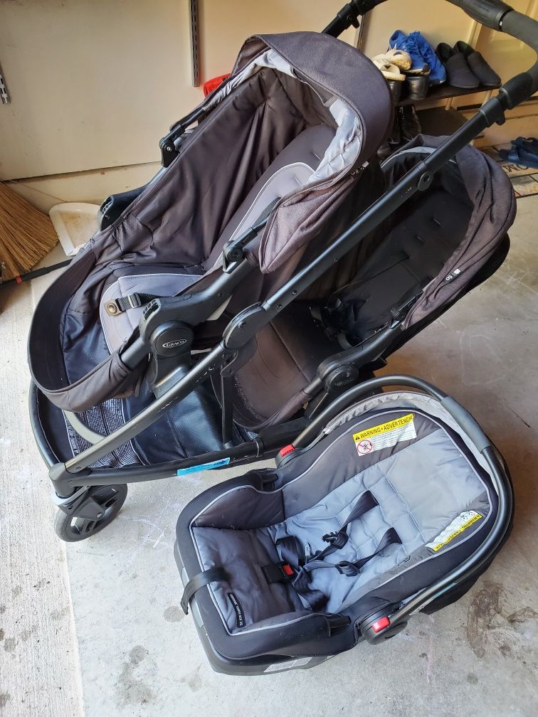 Gracco double stroller with car seat.