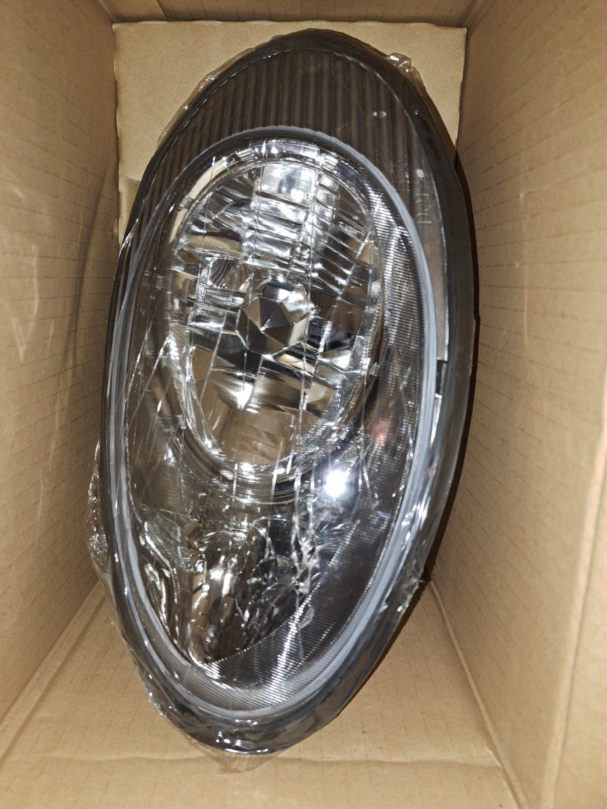 Eagle Eyes Left Headlight Assembly for 96-98 Ford Taurus Part # FL193-B001L