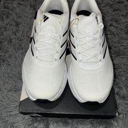 Size 9, men’s brand new unworn Adidas shoes with tags and box