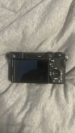 Sony a6700 ,lens 4.5-6.3/55-210, camera backpack
