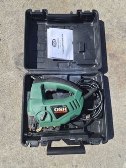 OSH branded 4.5 Amp laser jigsaw in a black plastic carrying case.