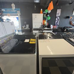 LG 5.3 Cu. Ft Top Load Washer And Gas Dryer in Alpine White