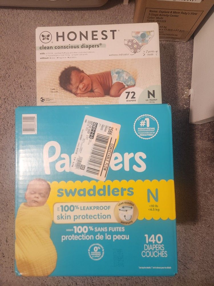 2 Boxes Of Newborn Diapers