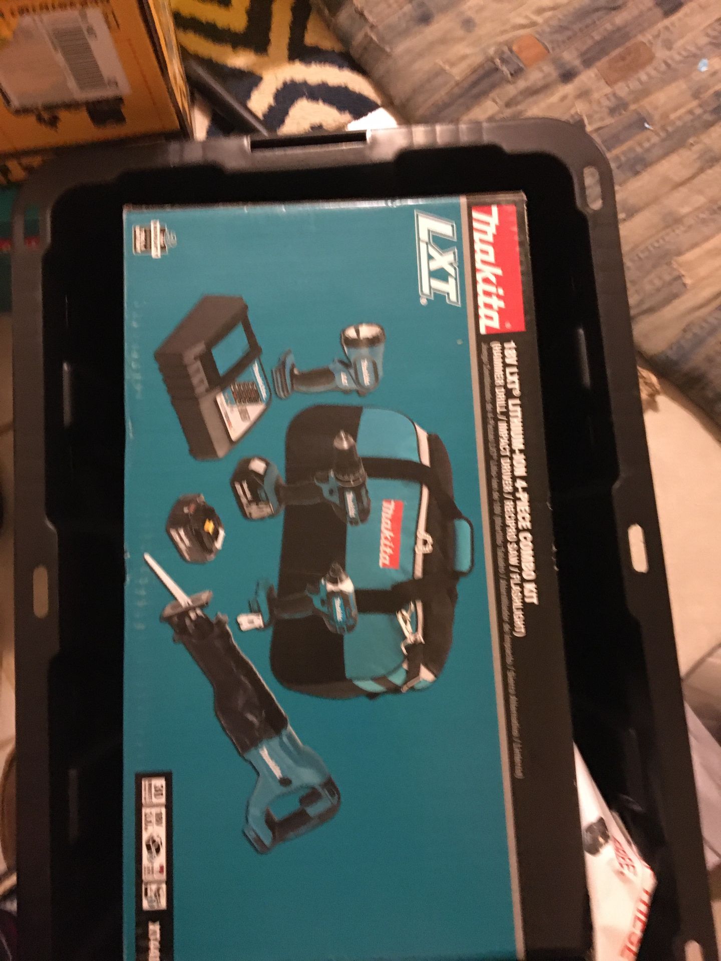 NEW MAKITA drill combo light and saw 18 v. batteries a charger and work bag new