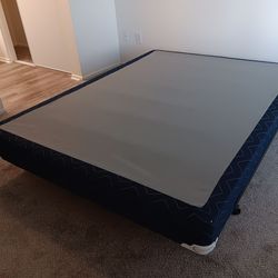 Queen Bed Frame  and Box Spring. Only One Year Old.