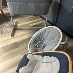 Bassinet, Electric Swing Chair . And a Rocky Chair . 