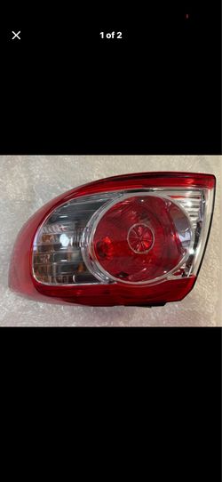 Tail light for 2010–2013 Hyundai Santa Fe.