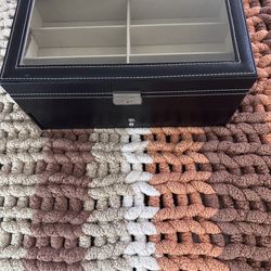 Black storage box with clear top for sunglasses