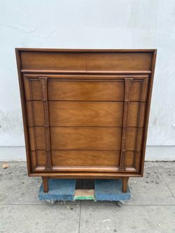 Mid century walnut high boy dresser by Drexel.