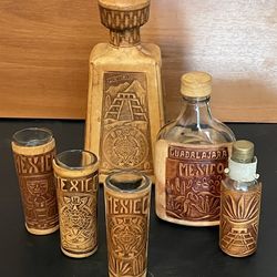 Hand Carved Leather Liquor Bottles And Shot Glasses 