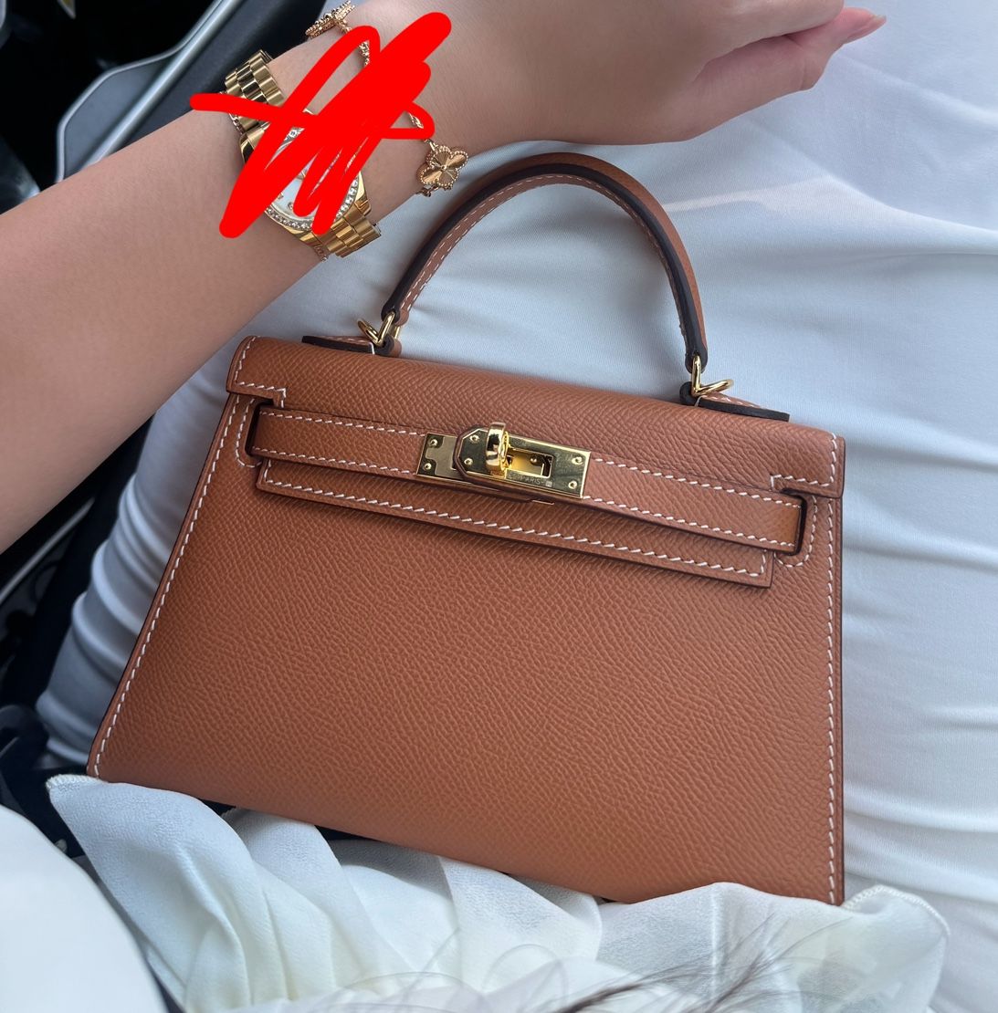 (CHECK DESC) Hermes Mini Kelly In gold.