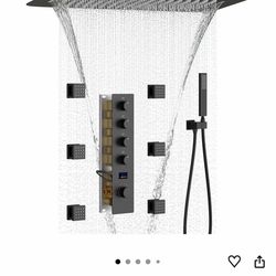 BRAND NEW Beautiful thermostatic shower system. Comes with an oversized huge shower head, the wall sprayer that is on a cord, the panel to control all