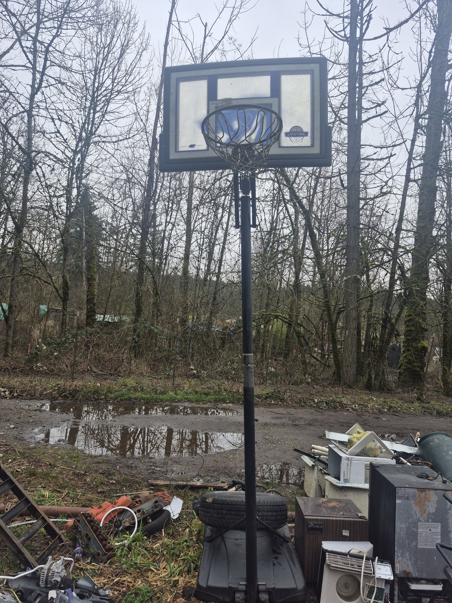 Basketball hoop --portable. No sand in base, ready to pour and use