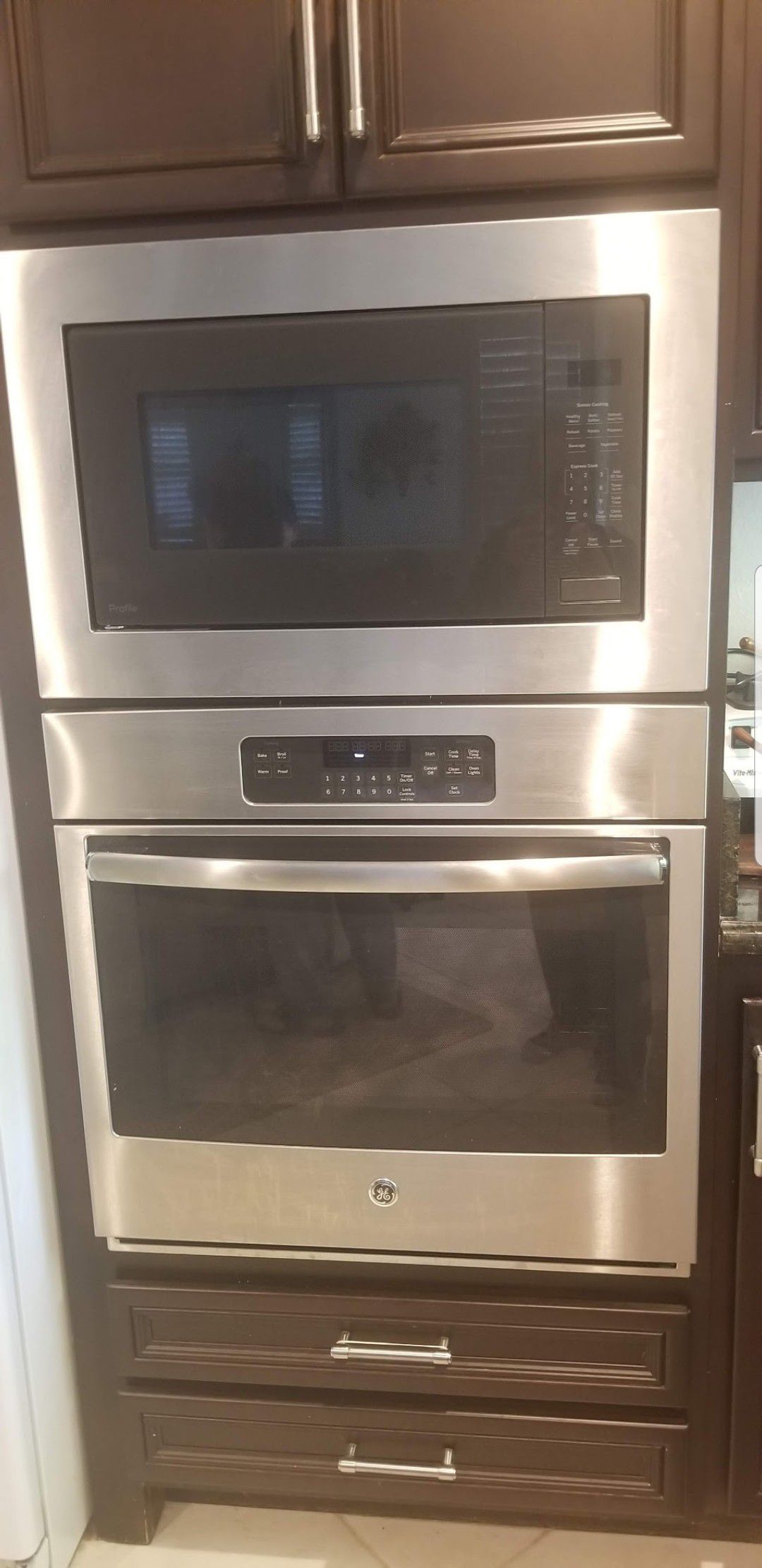 GE Profile Series 2.2 Cu. Ft. Built in Sensor Microwave Oven and GE Electric Wall Ovens Self Cleaning with Steam + Range Hood