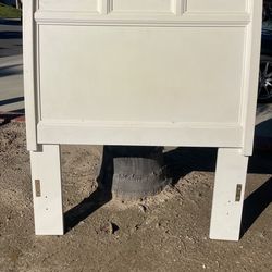 Beige Twin bed with frame and box spring
