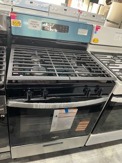 Whirlpool gas stove 4 burners in stainless steel