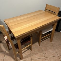 Wooden Table And Two Chairs