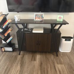 Table With Cabinet Soace And Book Shelfs On The Side