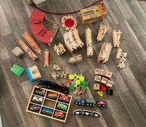 Wooden train tracks and trains