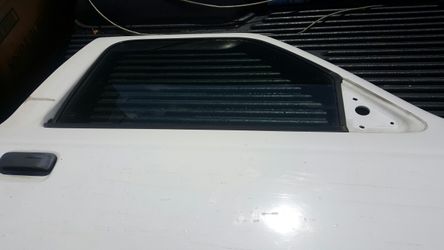 2004 Ford Ranger passenger door glass with regulator, motor, and door lock. Also passenger access cab interior door panel with seatbelt..