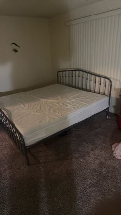 Pillow top queen size mattress with bed frame