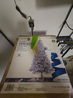GE StayBright 7.5 ft Pre-Lit Flocked Christmas Tree
