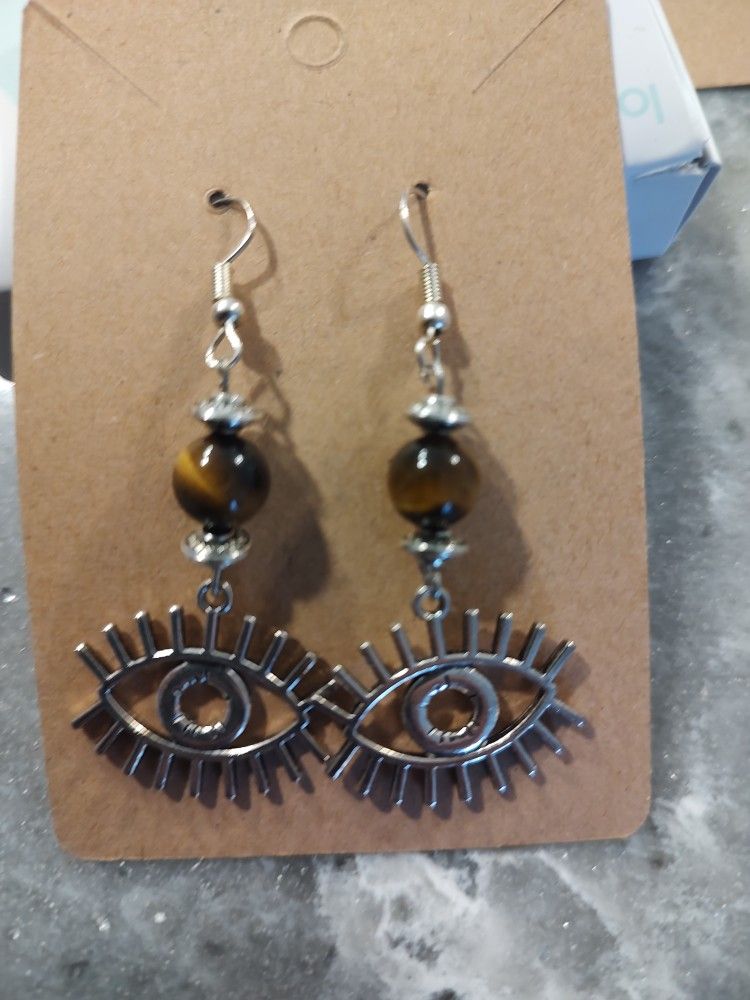 Eye Design Earrings-Unique eye design earrings with bead detail.