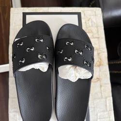Black Gucci slides 