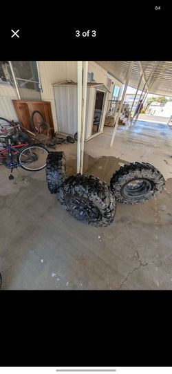 Canam 30 inch carnavor tires and rim
