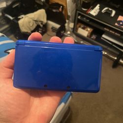 Blue Nintendo 3DS Console And Pokemon Platinum
