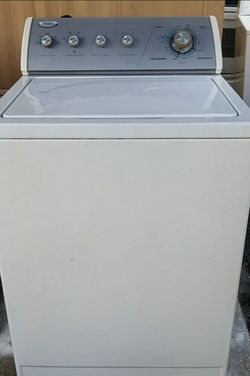 LIKE NEW INSIDE AND OUT WHIRLPOOL,NO LID LOCKS OR COMPUTER WASHER