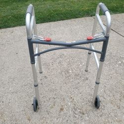 Folding walker with wheels