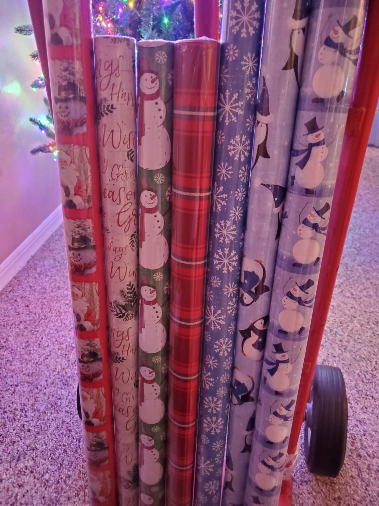 7 Rolls Of Christmas Paper 4 Tall Rolls and 3 Short Rolls