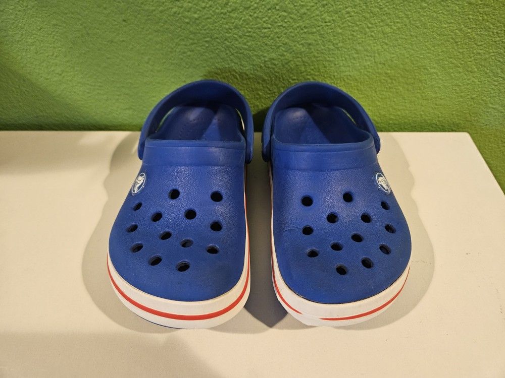 Toddler Blue/White/Red Crocs. Size 11C