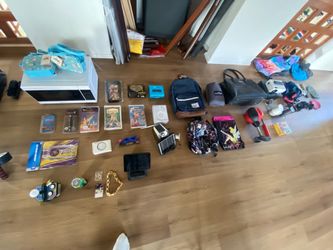 Lot of items $10 each bags, purses, trash cans, lakers, disney, camera, games, speakers
