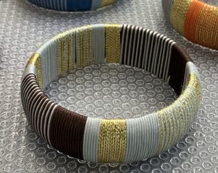 Wide textile bangle bracelets, $12 each, Cara N.Y., Nordstrom